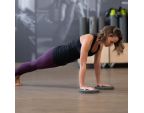 Exercice de gainage avec les disques rotatifs Balanced body® Ø23 cm