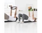 Duo entrain de s'entraîner avec le Pilates Circle Compact SISSEL® 