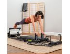 Entraînement avec le Metro™ IQ® Reformer Balanced Body® rangement placard