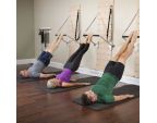 Groupe de Pilates sur le dos avec Push through bar sur Springboard™