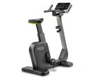 Vélo d'appartement compact Technogym Cycle vue de 3/4 arrière