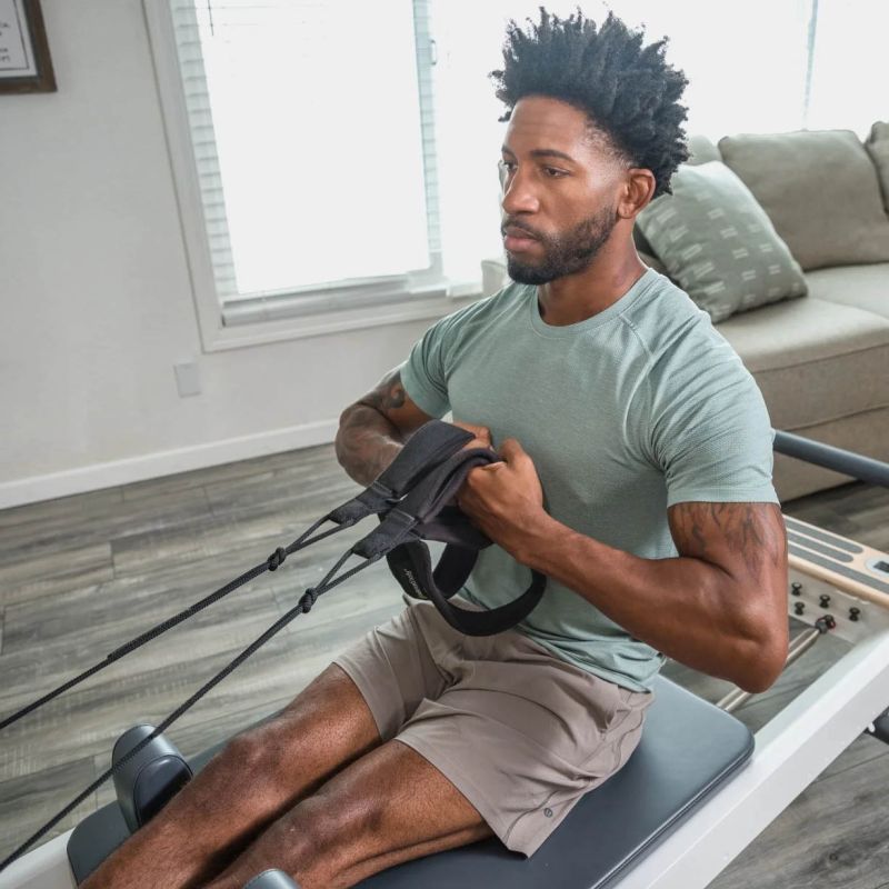Double Loops Soft Touch Padded en utilisation sur reformer avec les bras