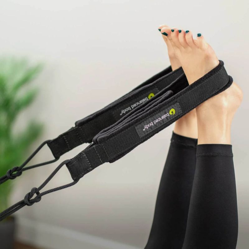 Double Loops Soft Touch Padded en utilisation sur reformer avec les pieds