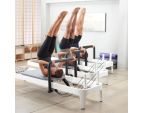 Exercice avec la barre Allegro® 2 Reformer Balanced body®